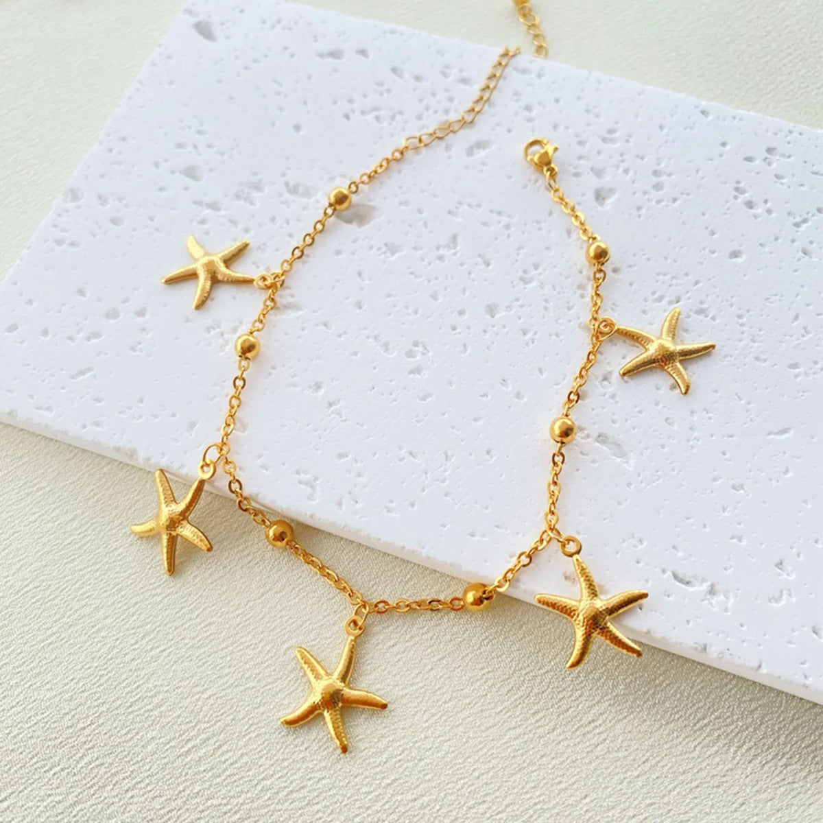 Gold Tone Stainless Steel Summer Ocean Theme Anklet - Dolphins, Starfish, Shell