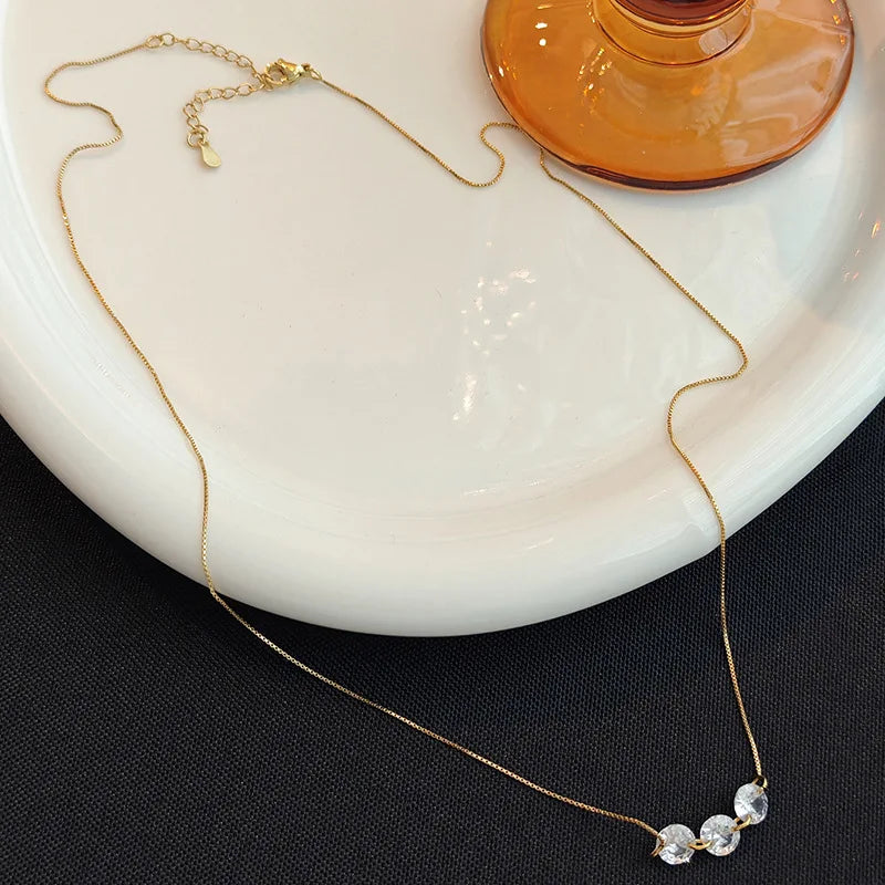 Delicate Cooper Necklace with Three Zircons