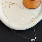 Delicate Cooper Necklace with Three Zircons